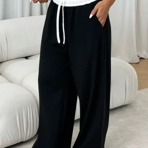 Pantalones deportivos de cintura alta, anchos y acampanados