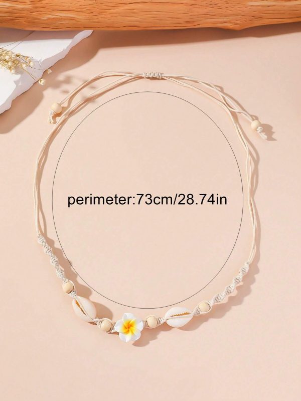 Collar ajustable de mujer con flor de arcilla de polímero y concha natural trenzada - Imagen 3