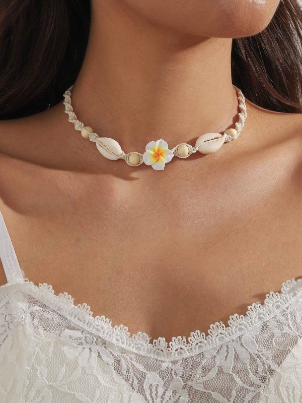 Collar ajustable de mujer con flor de arcilla de polímero y concha natural trenzada