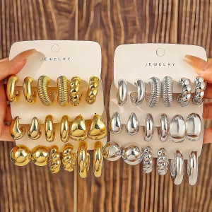 piezas de aretes de resina acrílica con forma de gota de agua exagerada en color dorado