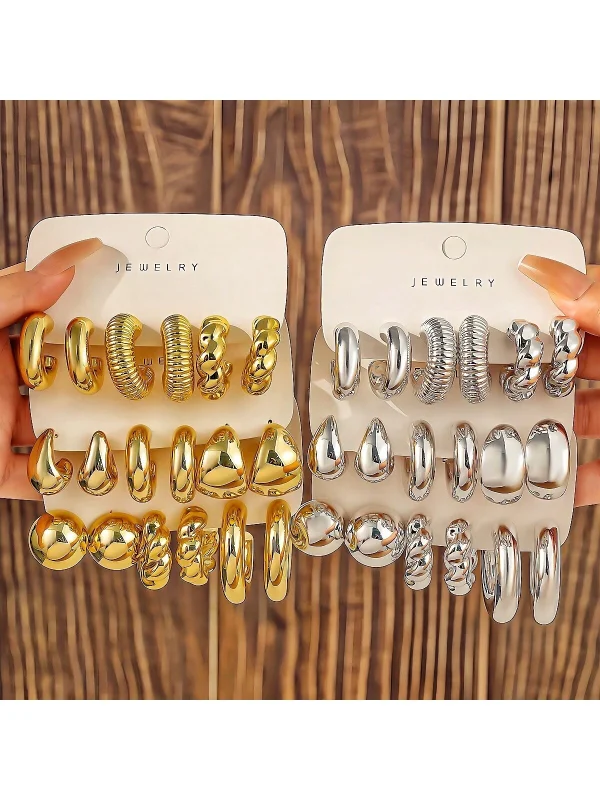 piezas de aretes de resina acrílica con forma de gota de agua exagerada en color dorado