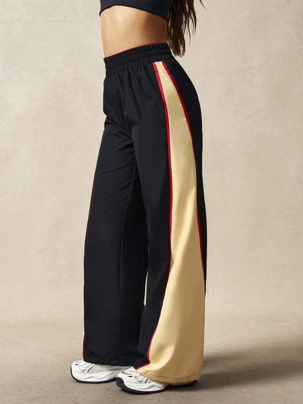 Pantalones deportivos casuales anchos de cintura elástica para mujer
