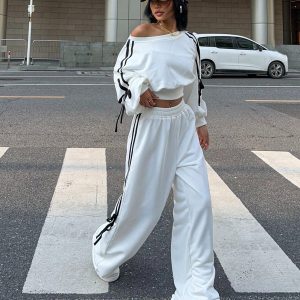Muchica 1 set Conjunto deportivo blanco de mujer con top de manga larga de cuello asimétrico