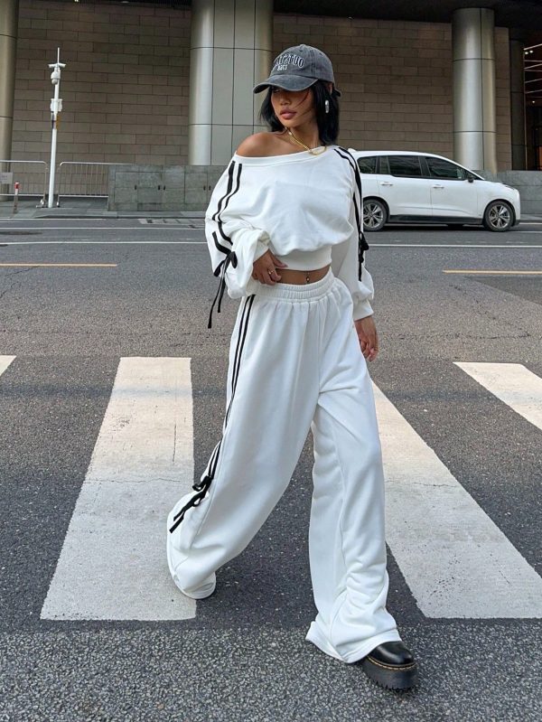 Muchica 1 set Conjunto deportivo blanco de mujer con top de manga larga de cuello asimétrico