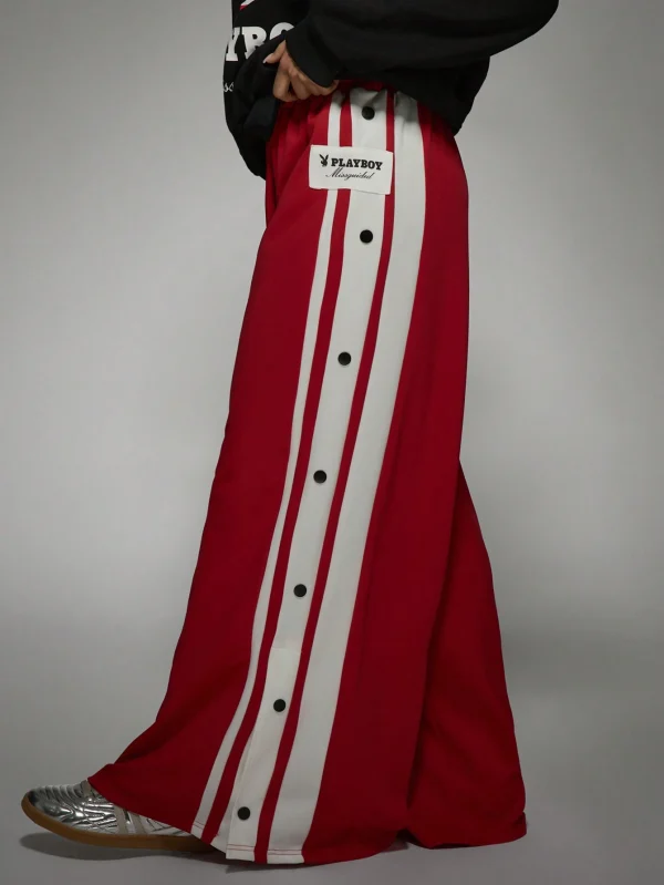 Playboy Pantalones deportivos premium con diseño de raya latera