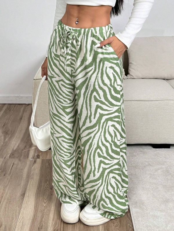 Pantalones estampados de cebra de pierna ancha de moda para mujer