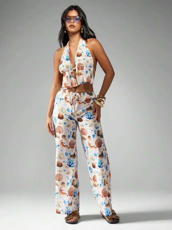 Conjunto de dos piezas con top de escote halter abierto por delante y pantalones